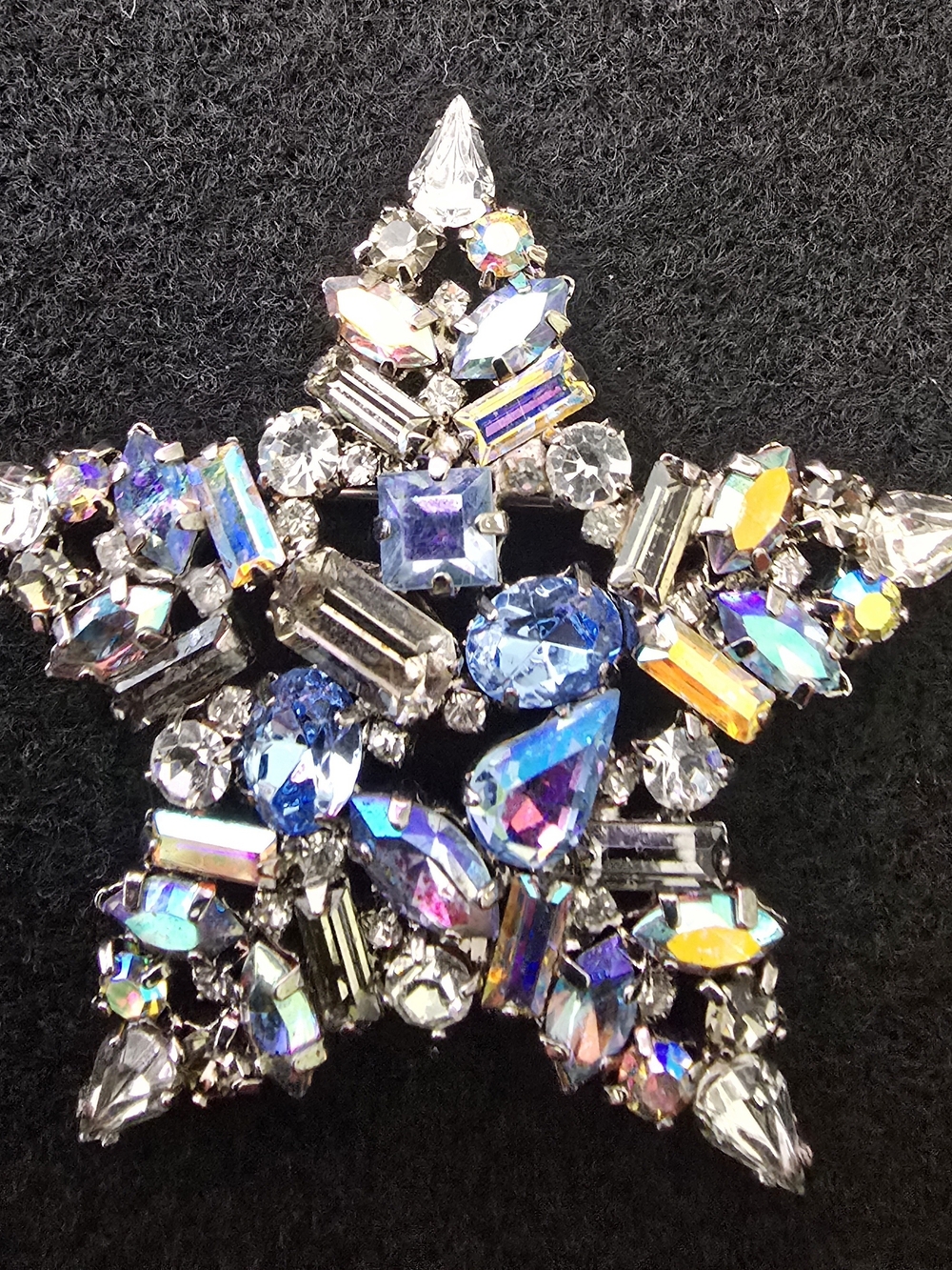 Rhinestone Starburst Brooch – Blue Crystal Accent